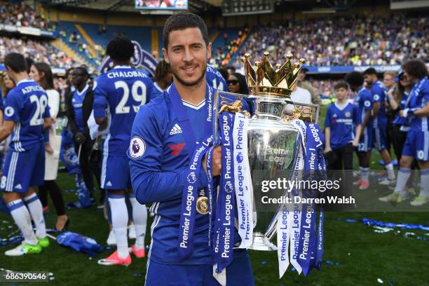 Eden Hazard of Chelsea poses with the Premier League Trophy after the Premier League match between Chelsea and Sunderland at Stamford Bridge on May...