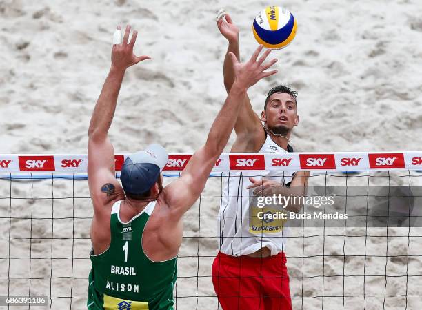 Bartosz Losiak of Poland spikes the ball during the Men's Finals match against Alison Cerutti and Bruno Oscar Schmidt of Brazil at Olympic Park...