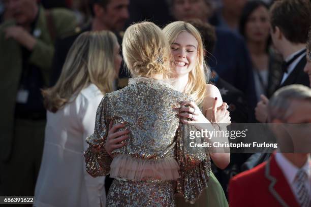 Actresses Elle Fanning and Nicole Kidman embrace after the 'How To Talk To Girls At Parties' screening during the 70th annual Cannes Film Festival at...