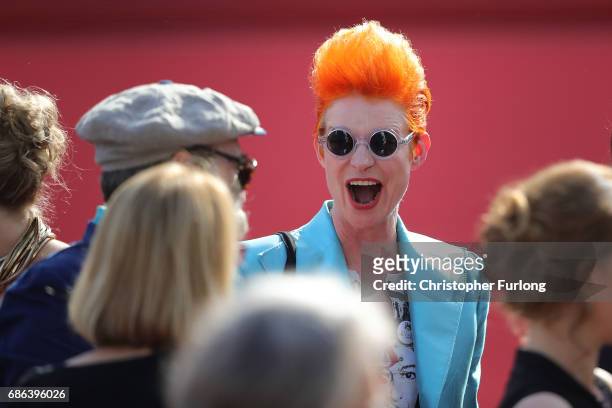 Costume designer Sandy Powell departs the 'How To Talk To Girls At Parties' premiere during the 70th annual Cannes Film Festival at Palais des...