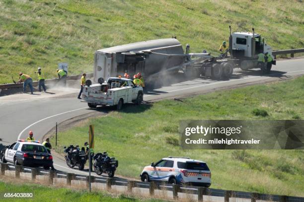 gravel semi-truck tips over morrison colorado highway off ramp police - lakewood colorado stock pictures, royalty-free photos & images