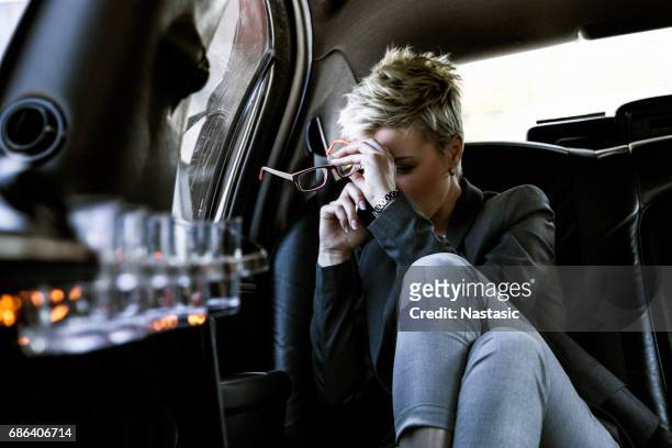 upset businesswoman - unhappy woman blonde glasses stock pictures, royalty-free photos & images