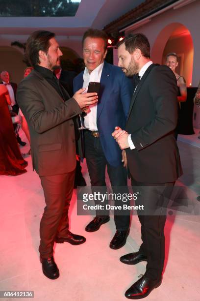 Michele Malenotti, Arnold Schwarzenegger and guest attend a dinner hosted by Jamie Reuben & Michael Kives with Arnold Schwarzenegger to celebrate...