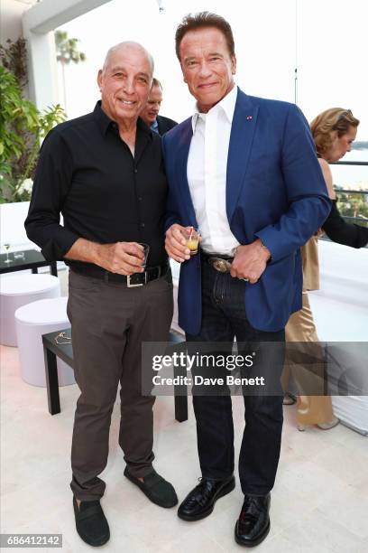 David Reuben and Arnold Schwarzenegger attend a dinner hosted by Jamie Reuben & Michael Kives with Arnold Schwarzenegger to celebrate Jean-Michel...