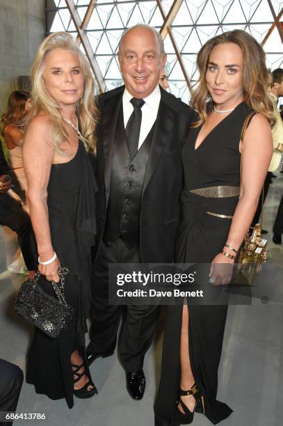 Tina Green, Sir Philip Green and Chloe Green attend the Fashion for Relief event during the 70th annual Cannes Film Festival at Aeroport Cannes...