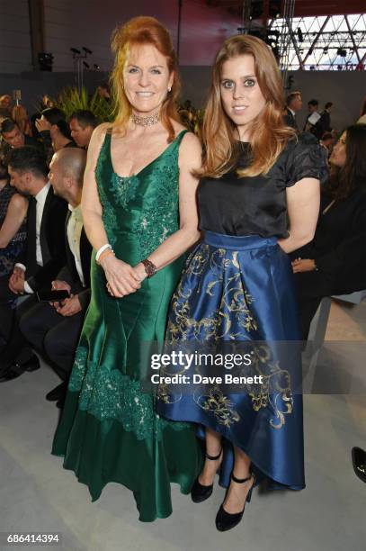 Sarah Ferguson, Duchess of York, and Princess Beatrice of York attend the Fashion for Relief event during the 70th annual Cannes Film Festival at...