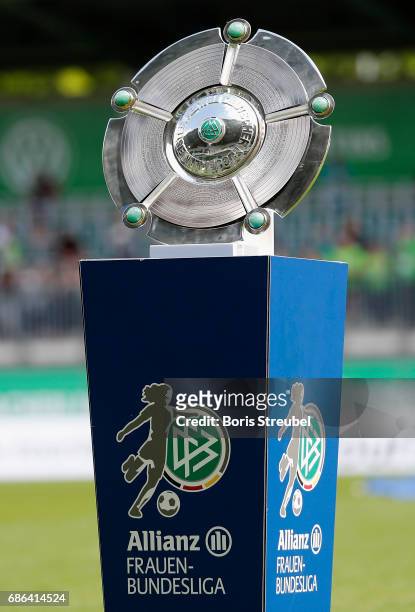 The Championship trophy is pictured prior to the Allianz Women's Bundesliga match between VfL Wolfsburg and FF USV Jena at AOK Stadion on May 21,...
