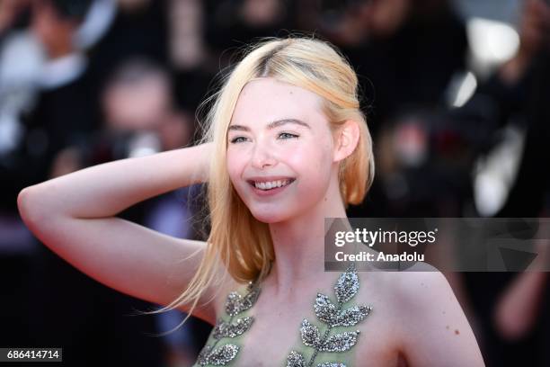 Actress Elle Fanning leaves after screening of the film How to talk to girls at parties out of competition at the 70th annual Cannes Film Festival in...