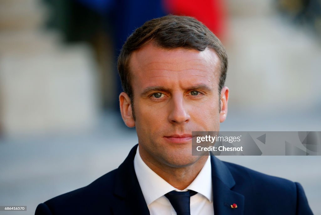 French President Emmanuel Macron Receives Paolo Gentiloni, iItalian President of the Council At Elysee Palace