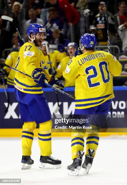 Joel Lundqvist of Sweden celebrate with team mate Victor Hedman the opening goal during the 2017 IIHF Ice Hockey World Championship Gold Medal game...