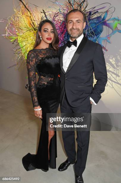 Leyla Aliyeva and Makram Azar attend the Fashion for Relief cocktail party during the 70th annual Cannes Film Festival at Aeroport Cannes Mandelieu...