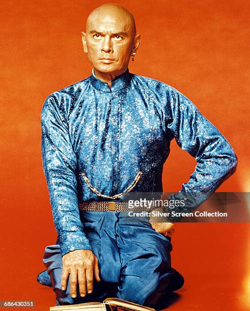 Actor Yul Brynner as King Mongkut of Siam in a publicity still for the film 'The King and I', 1956.