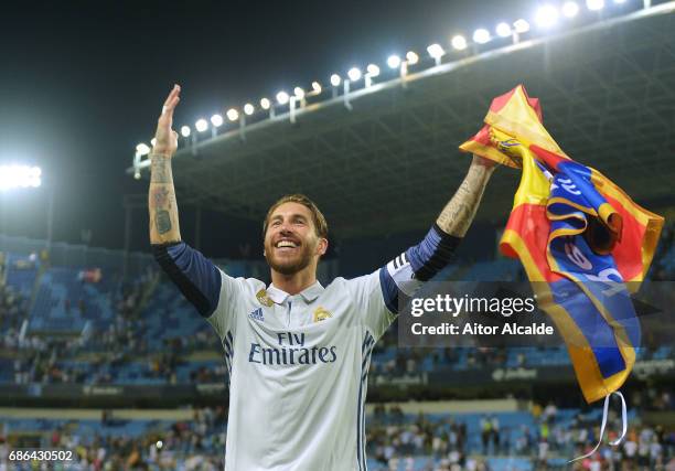 Sergio Ramos of Real Madrid celebrates after his side are crowned champions following the La Liga match between Malaga and Real Madrid at La Rosaleda...