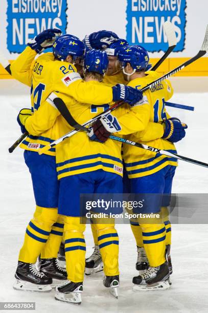 Alexander Edler celebrates his goal with teammates during the Ice Hockey World Championship Semifinal between Sweden and Finland at Lanxess Arena in...