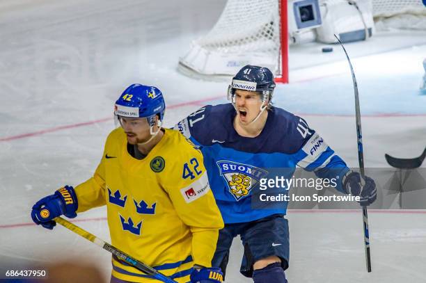 Antti Pihlstrom celebrates a goal during the Ice Hockey World Championship Semifinal between Sweden and Finland at Lanxess Arena in Cologne, Germany,...