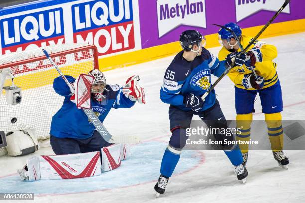 John Klingberg scores a goal against Goalie Harri Sateri during the Ice Hockey World Championship Semifinal between Sweden and Finland at Lanxess...