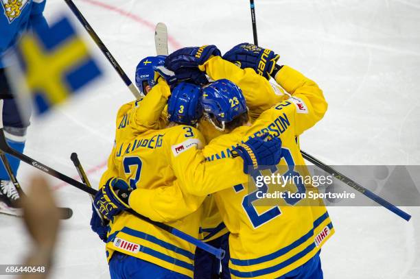 John Klingberg celebrates his goal with teammates during the Ice Hockey World Championship Semifinal between Sweden and Finland at Lanxess Arena in...