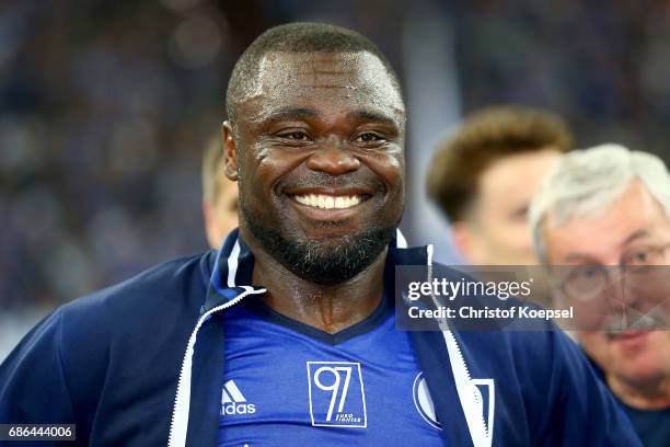 Gerald Asamoah of Eurofighter and Friends smiles after the 20 years of Eurofighter match between Eurofighter and Friends and Euro All Stars at...