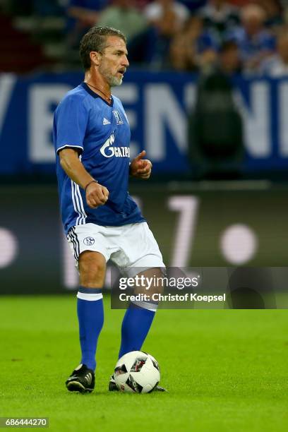 Marco Kurz of Eurofighter and Friends runs with the ball during the 20 years of Eurofighter match between Eurofighter and Friends and Euro All Stars...