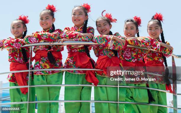 Girls from the Luochuan Yangko dance troupe from Yan'an city, Shaanxi province, China aboard Princess Cruises' newest ship "Majestic Princess"...