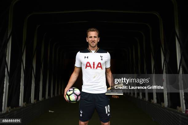 Harry Kane of Tottenham Hotspur poses in the tunnel with the golden boot and match ball after the Premier League match between Hull City and...