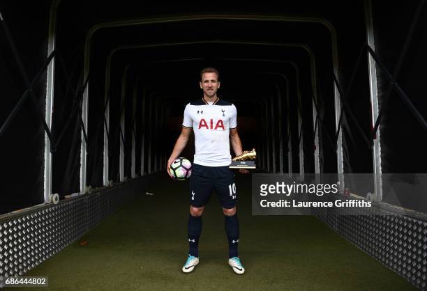 Harry Kane of Tottenham Hotspur poses in the tunnel with the golden boot and match ball after the Premier League match between Hull City and...