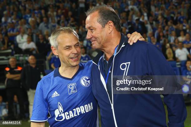 Olaf Thon and head coach Huub Stevens of Eurofighter and Friends talk during the 20 years of Eurofighter match between Eurofighter and Friends and...