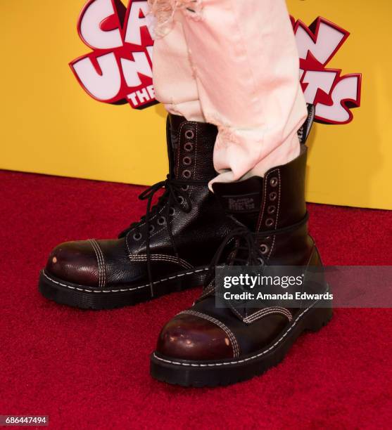 Singer Adam Lambert, shoe detail, arrives at the premiere of 20th Century Fox's "Captain Underpants: The First Epic Movie" at the Regency Village...