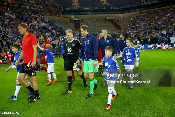 Theteams enter the pitch prior to the 20 years of Eurofighter match between Eurofighter and Friends and Euro All Stars at Veltins Arena on May 21,...