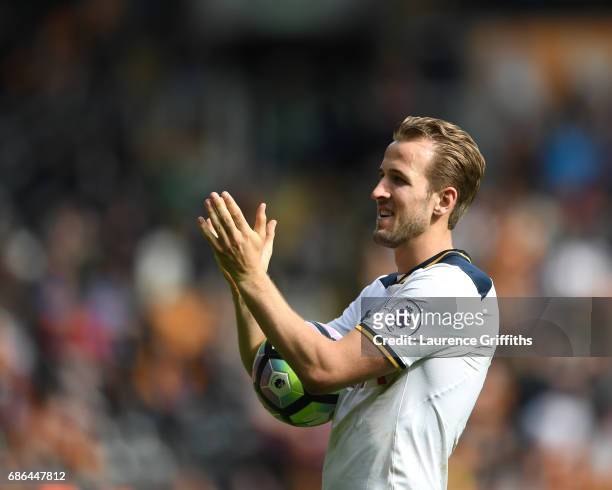 Harry Kane of Tottenham Hotspur celebrates with the fans after scoring a hat-trick and winning the Premier League Golden Boot award during the...