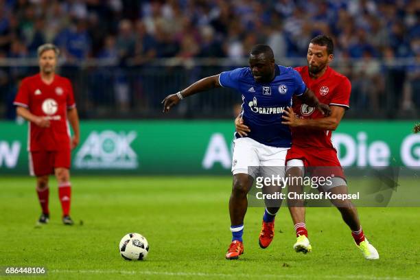 Kevin Kuranyi of Euro All Stars challenges Gerald Asamoah of Eurofighter and Friends during the 20 years of Eurofighter match between Eurofighter and...