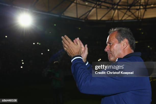 Head coach Huub Stevens of Schalke does a lap of honour after the 20 years of Eurofighter match between Eurofighter and Friends and Euro All Stars at...