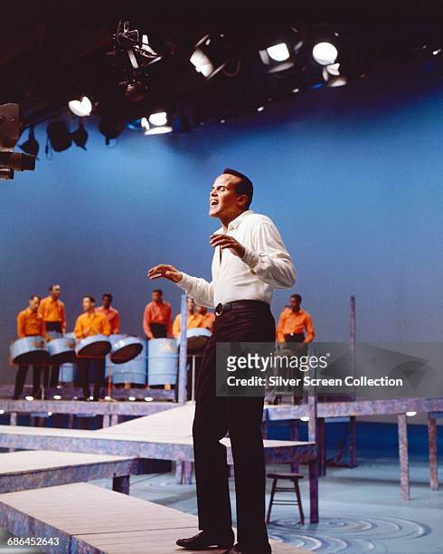 American singer and actor Harry Belafonte performs in 'Adventures in Music' - episode 101 of the television series 'The Bell Telephone Hour',...