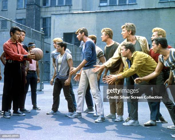 Actors George Chakiris, Tony Mordente, Tucker Smith and Russ Tamblyn in a scene from the musical film 'West Side Story', 1961.