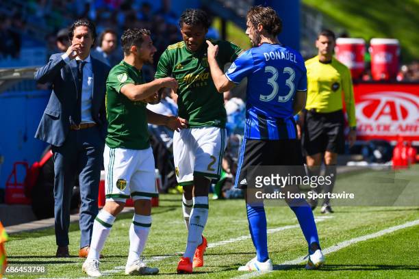 Montreal Impact midfielder Marco Donadel and Portland Timbers midfielder Sebastian Blanco agruing on the sidelines during the Portland Timbers versus...