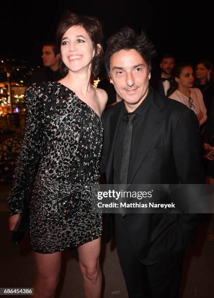 Yvan Attal and Charlotte Gainsbourg attend the Women in Motion Awards Dinner at the 70th Cannes Film Festival at Place de la Castre on May 21, 2017...