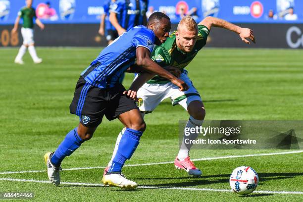 Montreal Impact midfielder Ballou Tabla and Portland Timbers defender Vytautas Andriuskevicius chasing the ball during the Portland Timbers versus...