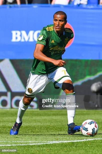 Portland Timbers defender Roy Miller running on the field with the ball during the Portland Timbers versus the Montreal Impact game on May 20 at...