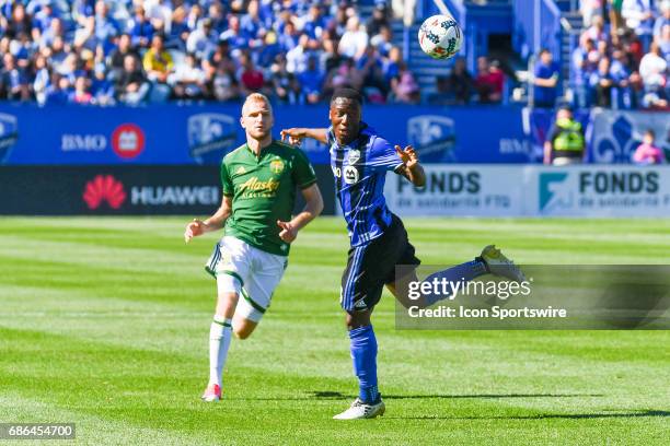 Montreal Impact midfielder Ballou Tabla looking at the ball in the air after hitting it with his head during the Portland Timbers versus the Montreal...