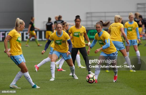 Manchester City Women players warm up in a Kick It Out tops before the WSL Spring Series Match between Manchester City Women and Yeovil Town Ladies...