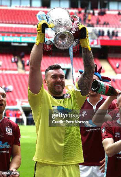 Liam Connell of South Shields holds aloft the Vase at the end of The Buildbase FA Vase Final between South Shields and Cleethorpes Town at Wembley...