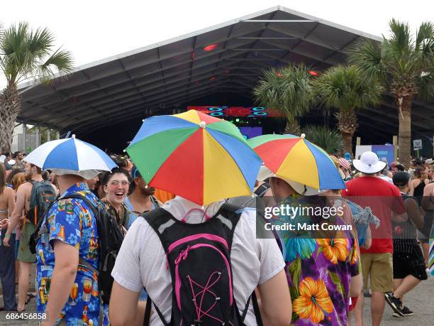 Festivalgoers wearing umbrella hats are seen during the Matoma performance at the Boom Boom Tent during 2017 Hangout Music Festival on May 21, 2017...