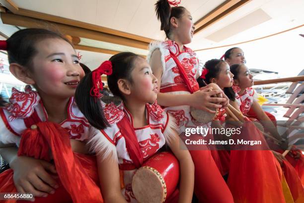 Girls from the Luochuan Yangko dance troupe from Yan'an city, Shaanxi province, China aboard Princess Cruises' newest ship "Majestic Princess"...