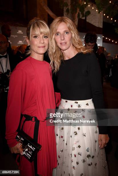 Marina Fois and Sandrine Kiberlain attend the Women in Motion Awards Dinner at the 70th Cannes Film Festival at Place de la Castre on May 21, 2017 in...