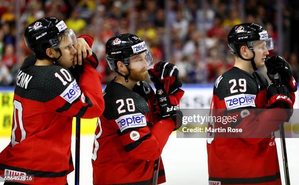 Brayden Schenn, Claude Giroux and Nate Mackinnon of Canada look dejected after the 2017 IIHF Ice Hockey World Championship Gold Medal game Canada and...