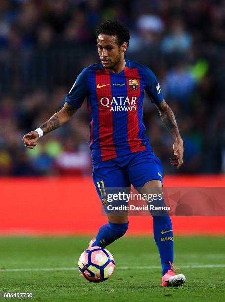 Neymar Jr. Of FC Barcelona runs with the ball during the La Liga match between Barcelona and Eibar at Camp Nou on 21 May, 2017 in Barcelona, Spain.