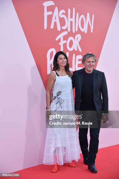Renzo Rosso and Arianna Alessi attends Fashion For Relief during the 70th annual Cannes Film Festival at Aeroport Cannes Mandelieu on May 21, 2017 in...