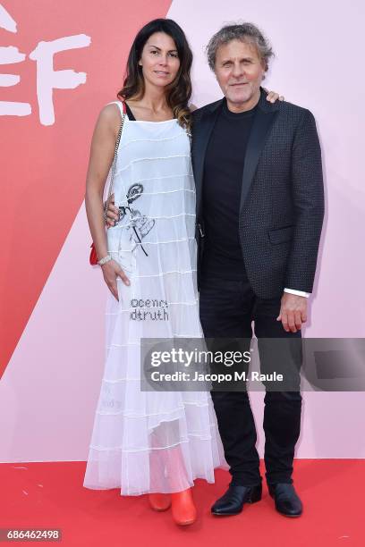 Renzo Rosso and Arianna Alessi attends Fashion For Relief during the 70th annual Cannes Film Festival at Aeroport Cannes Mandelieu on May 21, 2017 in...