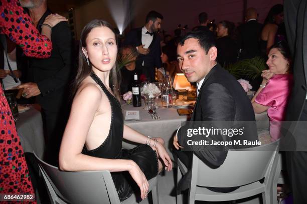 Nicola Formichetti and Anna Cleveland attends Fashion For Relief during the 70th annual Cannes Film Festival at Aeroport Cannes Mandelieu on May 21,...