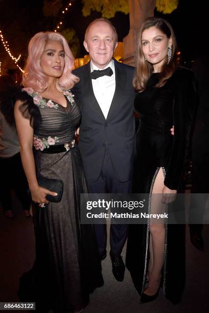 Salma Hayek, Francois-Henri Pinault and Laetitia Casta attend the Women in Motion Awards Dinner at the 70th Cannes Film Festival at Place de la...